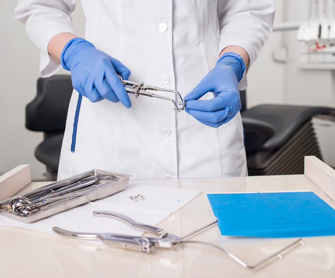 Dentist With Dental Tool